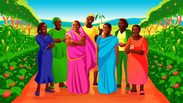 Eine Gruppe fröhlicher Frauen steht in einem üppigen Garten, umgeben von blühenden Pflanzen.